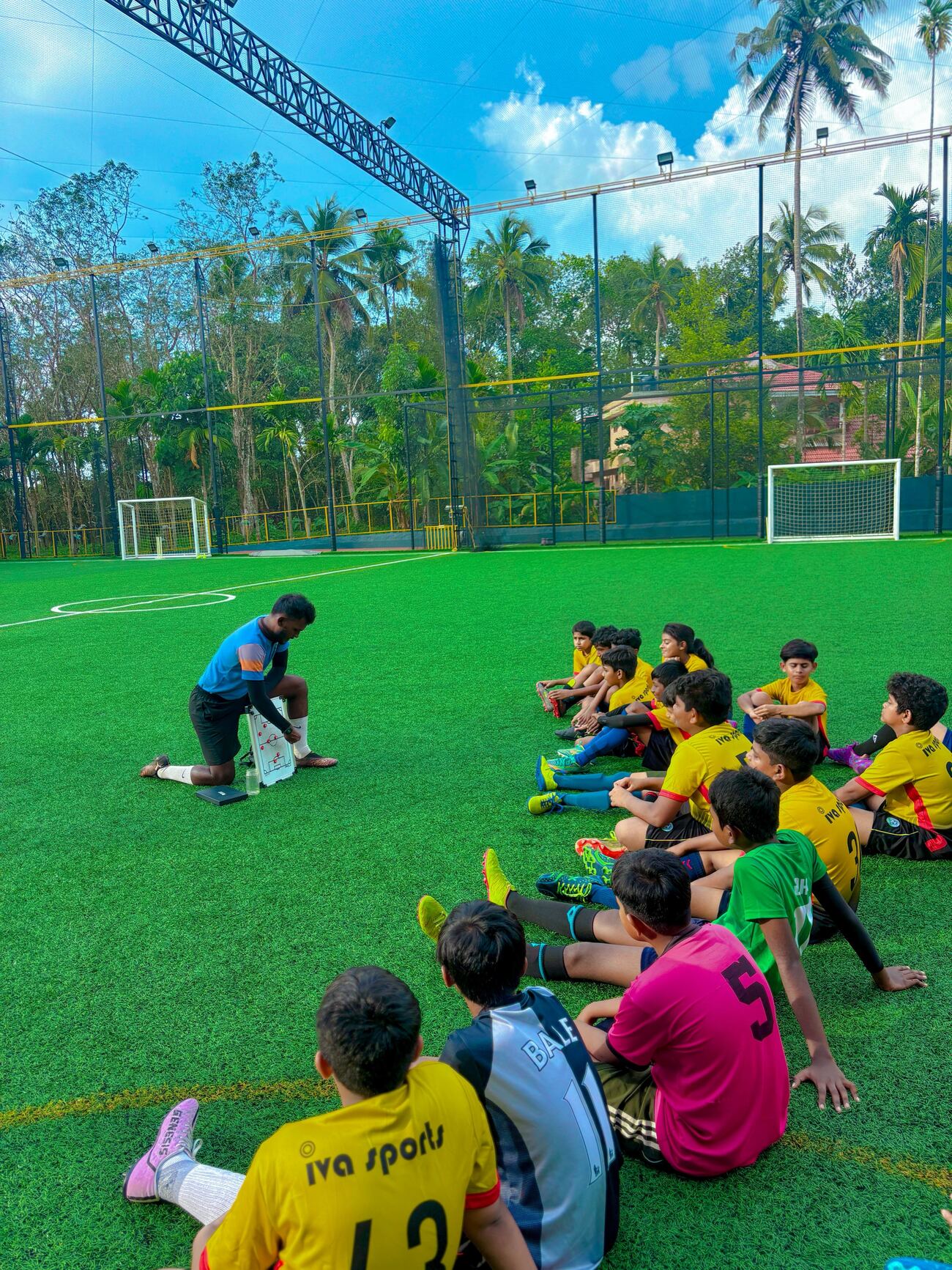 Coach explaining tactics to young players